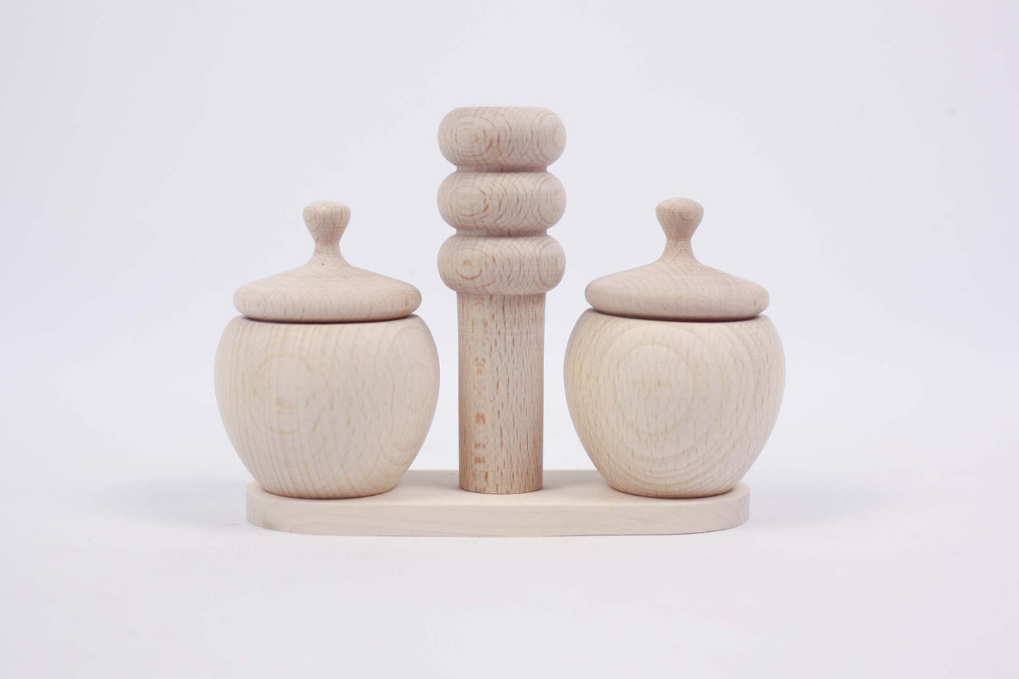 Two Small Salt Shakers with Lids, Handles and a Pillar (set)